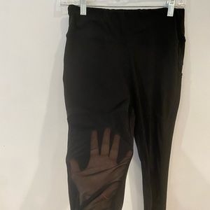 Black leggings with front of whole leg mesh. Has pockets!